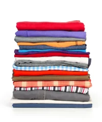 depositphotos_13202888-stock-photo-stacks-of-colorfull-clothes-on